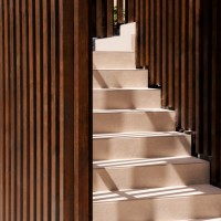 Contextual Reuse: Transforming a Coastal Shell into Seaside Suites