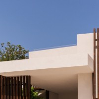 Contextual Reuse: Transforming a Coastal Shell into Seaside Suites