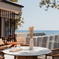 Contextual Reuse: Transforming a Coastal Shell into Seaside Suites