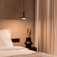 Contextual Reuse: Transforming a Coastal Shell into Seaside Suites