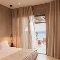 Contextual Reuse: Transforming a Coastal Shell into Seaside Suites