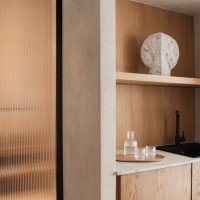 Contextual Reuse: Transforming a Coastal Shell into Seaside Suites